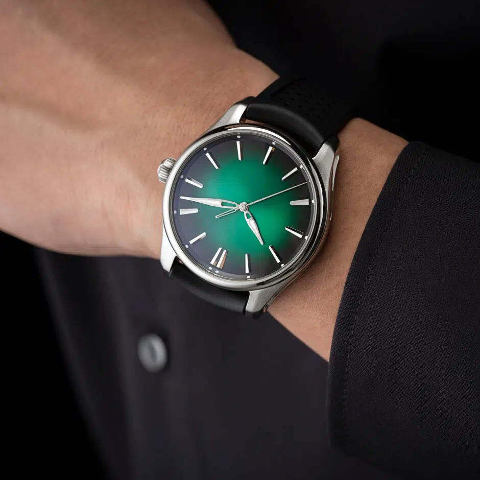 hmoser 3201 1201 pioneer centreseconds cosmicgreen 40mm lifestyle wristshot present shirt